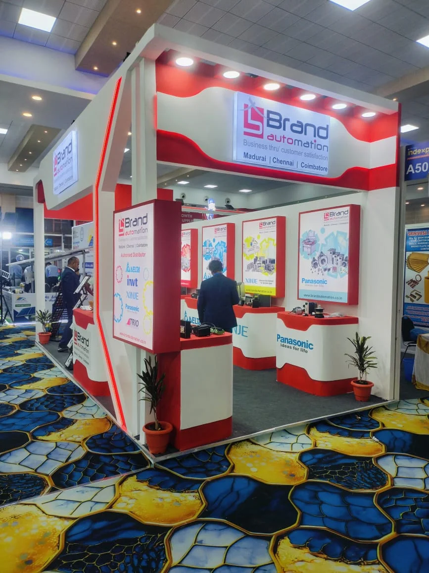 Corner exhibition stall designed and fabricated by ADMUG Studio for Brand Automation