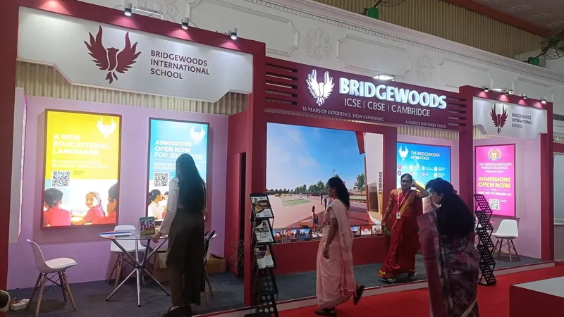 Custom exhibition stall designed and fabricated by ADMUG Studio for Bridgewoods International School