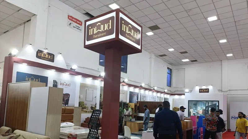 Custom exhibition stall designed and fabricated by ADMUG Studio for Inwud Furniture