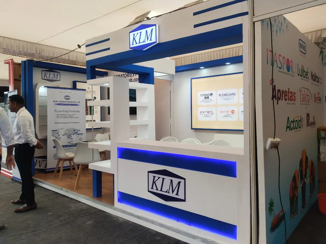 Corner exhibition stall designed and fabricated by ADMUG Studio for KLM Laboratories