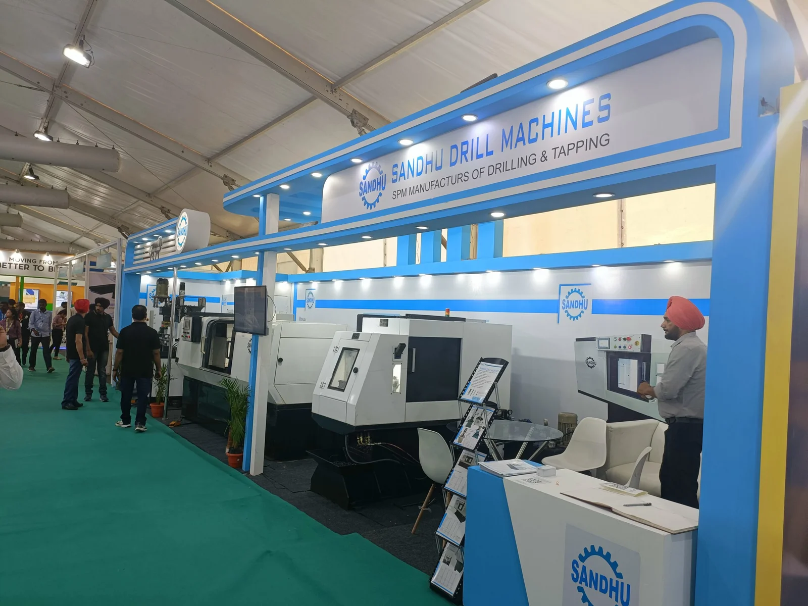 Custom exhibition stall designed and fabricated by ADMUG Studio for Sandhu Drill Machines