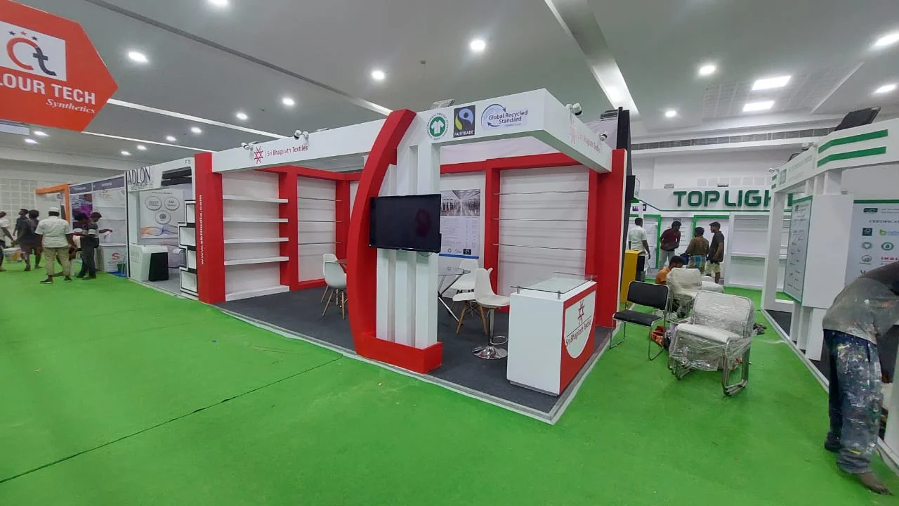 Corner exhibition stall designed and fabricated by ADMUG Studio for Sri Bhagirath Textiles